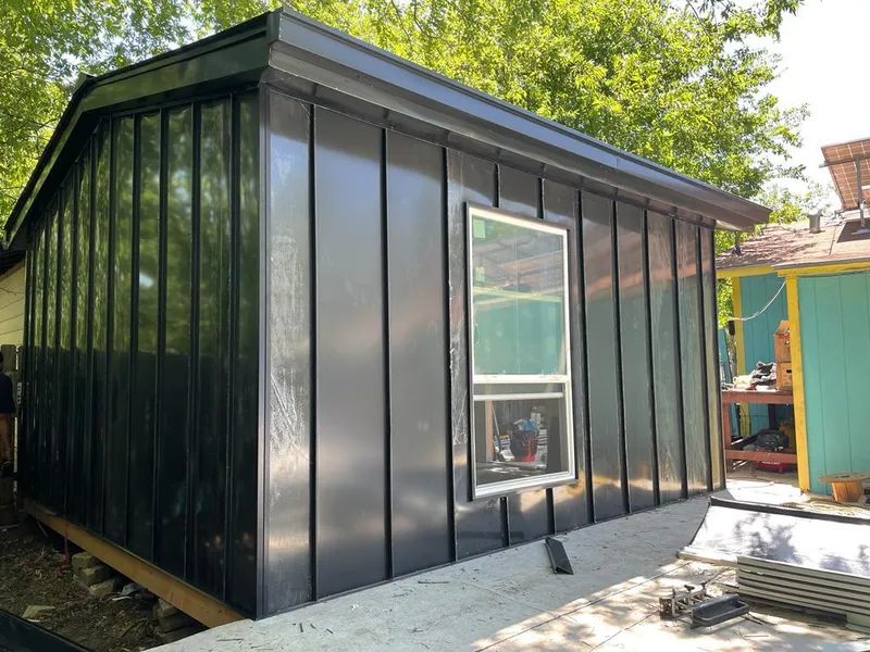 Black standing seam metal wall panels for Metal Roof Installation in Milford