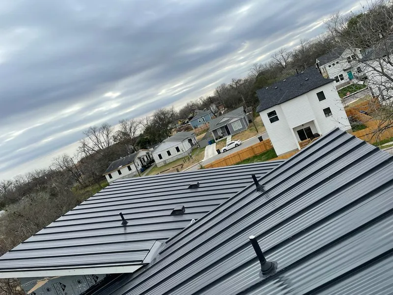 Standing seam metal roof panels with vents for Skylight Repair in Milford